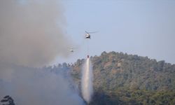 20 helikopter ve 14 uçaklık hava gücüyle Marmaris'teki yangına müdahaleye başladı.