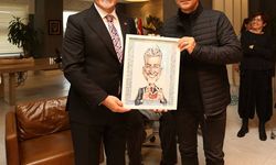 Ödüllü karikatüristler Başkan Turgay Erdem'i ziyaret etti